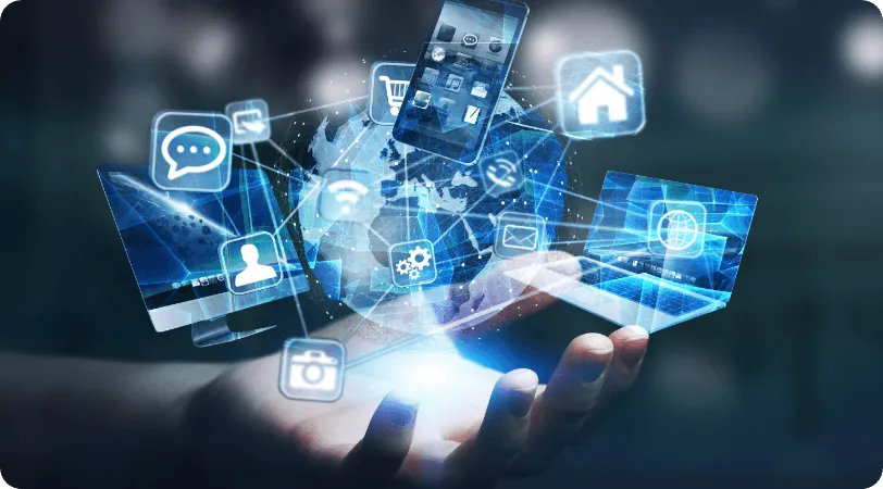 Hand holding glowing digital devices and app icons